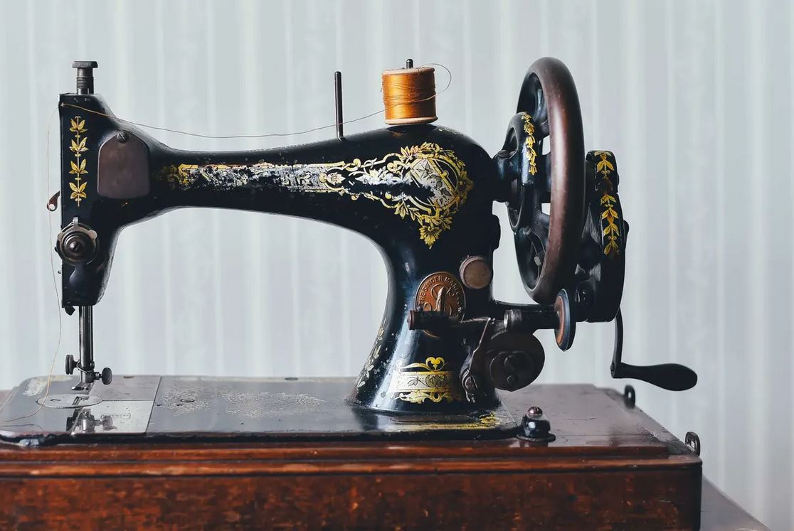 Old sewing machine on the table
